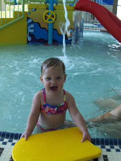 Child Enjoying Time in Pool.jpg Opens in new window